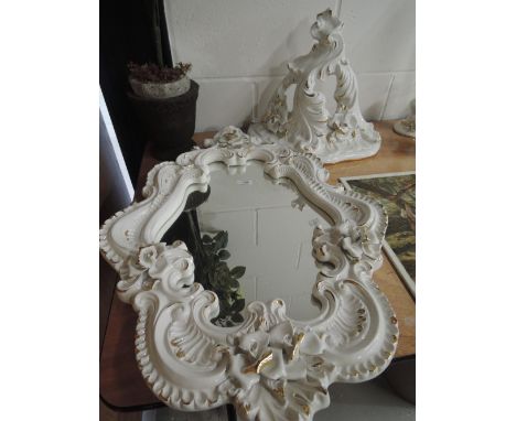 A modern decorative ceramic mirror and wall sconce shelf bracket etc