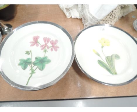 A selection of vintage ceramic display and cabinet plates with hand painted flowers