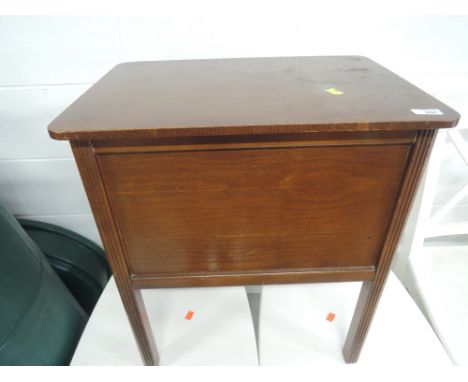 A vintage oak sewing box