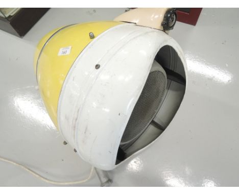 A vintage Hair dryer or blow dry hood converted into a light, bright retro yellow