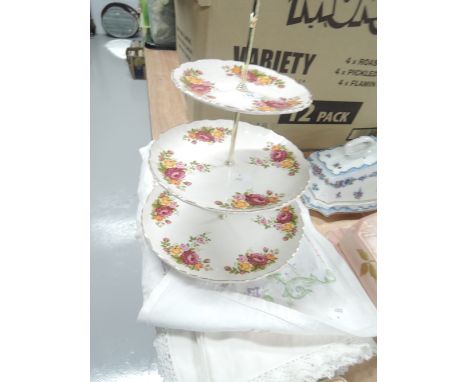 A vintage ceramic cake stand by James Kent 