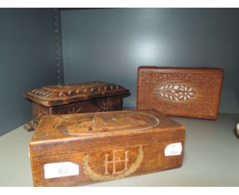 A selection of carved wooden trinket and jewellery boxes