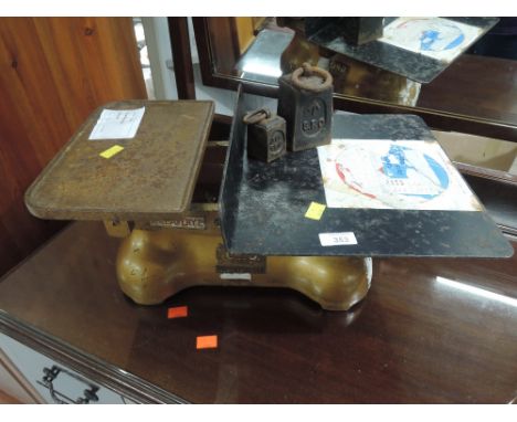 A set of vintage postal scales, labelled for Avery and G.P.O. and 2 goverment issue weights