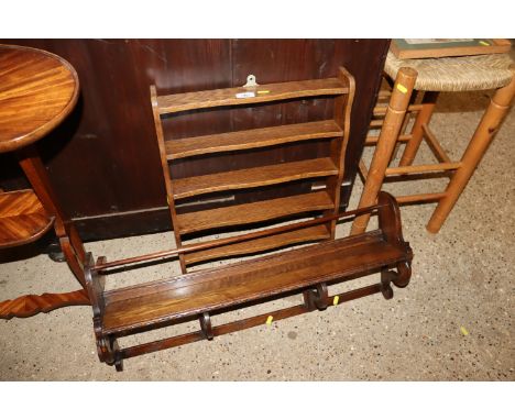 An oak wall shelf and a smaller similar 