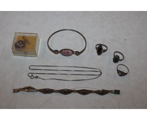 A 925 silver necklace, a 925 silver bracelet set with coloured stones, a white metal bangle set polished stone, two rings and
