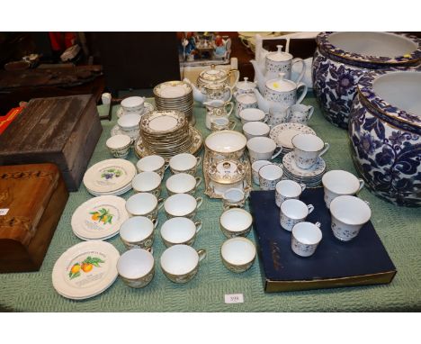 A Noritake gilt decorated tea set; another with floral decoration; a collection Gien fruit plates etc. 