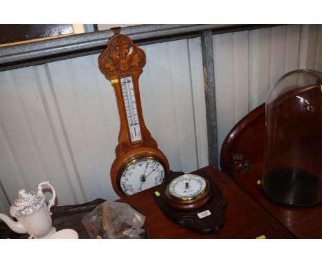 An oak cased aneroid barometer by F. Fish & Son, Buttermarket Ipswich; and a golden oak cased banjo barometer