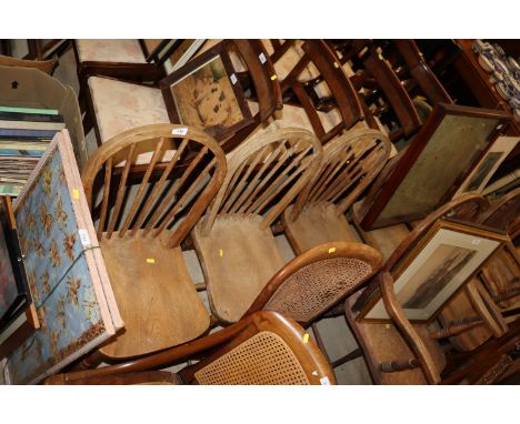 A set of six elm seated stick back dining chairs 