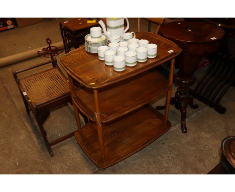 An Ercol three tier tea trolley