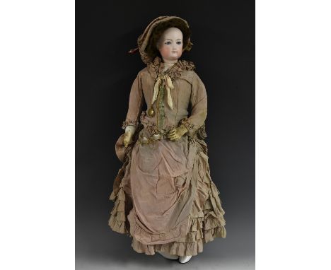 A Ferdinand Gautier bisque head doll, Lady of Fashion, with blue open eyes, closed mouth,  ears, lambs skin body, pink silk d