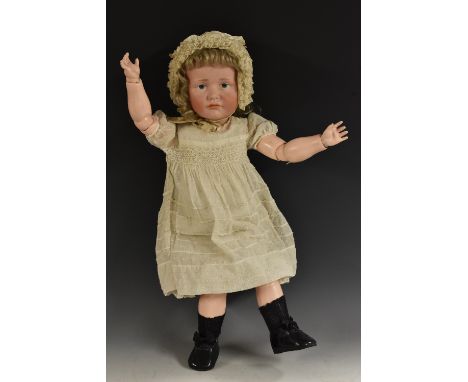 A Kämmer &amp; Reinhardt 114 Gretchen character girl doll, with blue painted eyes, closed pouty mouth, long curly blonde hair