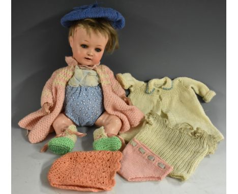 Heubach Koppelsdorf - an early 20th century bisque head socket doll, sleeping blue eyes, open mouth, light brown wig, bent li