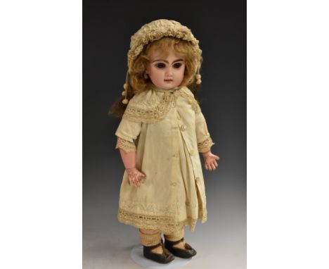 A Tete Jumeau bisque head Bebe, French circa 1885, the  pale bisque head with fixed brown glass paper-weight eyes, finely pai