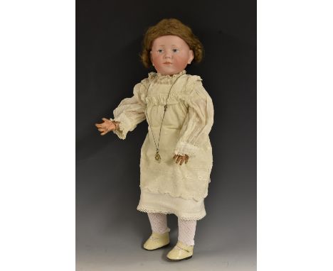 A Kammer &amp; Reinhardt 101 bisque head character doll, 'Marie', c.1910, with very fine pale bisque head, painted pale blue 
