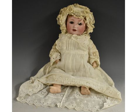 Armand Marseille - a character bisque head socket doll, sleeping brown eyes, open mouth with two teeth, light brown hair, com