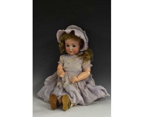 A Kammer &amp; Reinhardt/Simon &amp; Halbig bisque head character doll, German,  circa 1910, with weighted blue glass eyes, p