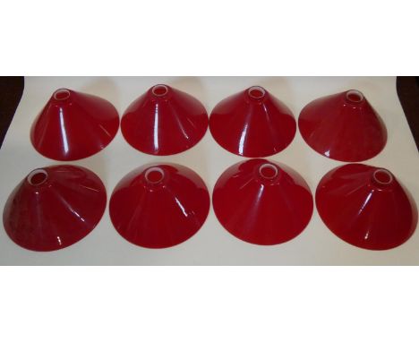A set of eight deep red vintage glass conical lamp shades. 16x30cm 