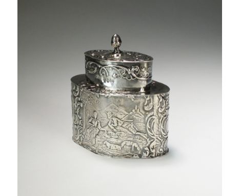 A continental silver tea caddy, Edwin Thompson Bryant, London 1897, of shaped oval form with embossed figural decoration with