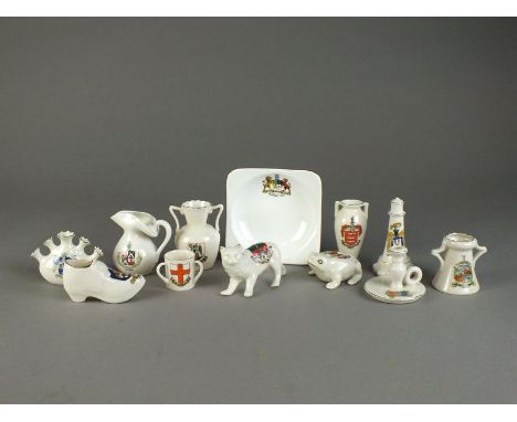 A collection of crested wares to include a Willow Art model of a cat with the crest of Windsor, an Imperial frog with the cre