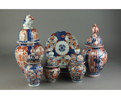 A small collection of Japanese Imari porcelainMeiji/Taisho periodIncluding a vase of lobed ovoid form, the high domed cover w