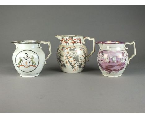 An early 19th century Sunderland lustre jug painted with houses within landscapes, 14cm high (repaired), two early 19th centu