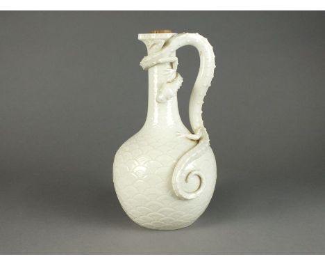 A Royal Worcester glazed parian dragon ewerCirca 1884Of bottle form, applied with a wrythen dragon forming the handle against