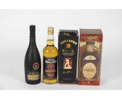 A box containing Glenfiddich, Cardhu highland Malt Scotch Whisky, the Original Dimple Deluxe Scotch Whisky, Cockspur VSOR, Ga