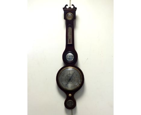 An early 19th century mahogany and boxwood strung wheel barometer, marked Caminada, Manchester with eight inch silver dial, h