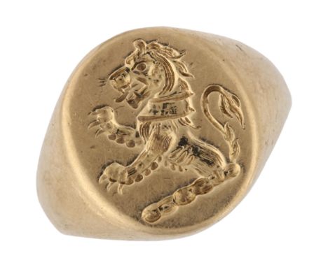 A mid-20th century 9ct gold seal signet ring, intaglio carved with rampant lion, hallmarks London 1956, setting height 14mm, 