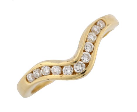 An 18ct gold diamond wishbone ring, channel set with modern round brilliant-cut diamonds, setting height 5.8mm, size K, 2.9gN