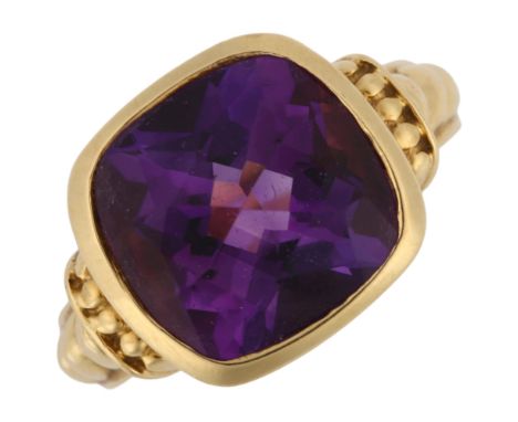 An 18ct gold amethyst dress ring, maker's marks JCR, setting height 13.5mm, size L, 10.2gNo damage or repairs, light wear to 