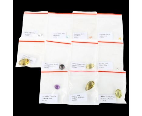 Various unmounted gemstones, including citrine, black pearl, aquamarine etcLot sold as seen unless specific item(s) requested