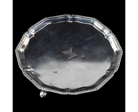 A George III silver salver, circular-shaped form with gadrooned rim, by John Crouch and Thomas Hannam, hallmarks London 1775,