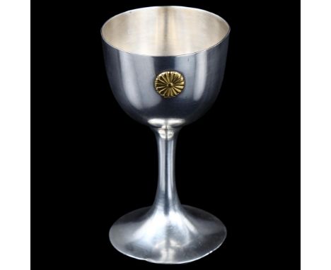 A Japanese silver Sake cup, with applied gold boss, marks on base, height 7.5cmFoot rim has 2 small dents, light abrasions al