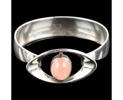 NIELS ERIK FROM - a Danish modernist sterling silver and rose quartz torque bangle, eye design, setting height 25mm, internal
