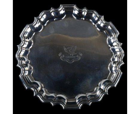 An Edwardian silver salver, circular form with scalloped rim and swan crest "Vincit Veritas" (Truth prevails), by Mappin & We