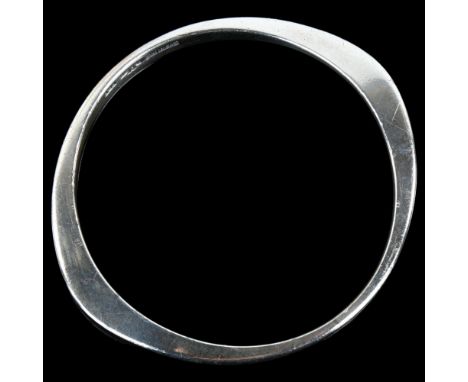 O PETERSEN - a Danish modernist sterling silver elliptical slave bangle, band width 6mm, internal circumference 19cm, 27.5gNo