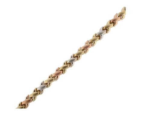 A Turkish 9ct three-colour gold cross bracelet, length 18.5cm, 3.9gNo damage or repairs, only light surface wear, fitting wor