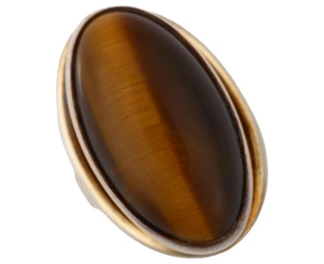 NIELS ERIK FROM - a Danish modernist sterling silver-gilt tigers eye dress ring, setting height 27mm, size N, 11gNo damage or