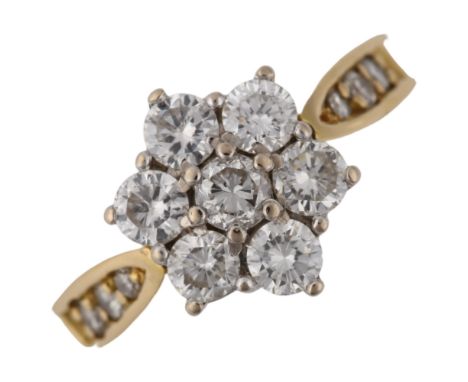 An 18ct gold diamond cluster ring, set with modern round brilliant-cut diamonds and diamond set shoulders, total diamond cont