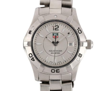 TAG HEUER - a lady's stainless steel Aquaracer quartz bracelet watch, ref. WAF1412, silvered dial with luminous tapered baton