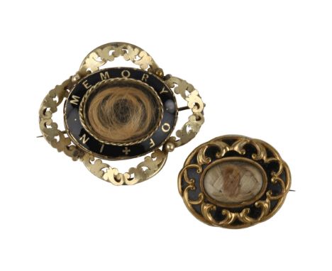 2 Victorian mourning brooches, gilt-metal settings with enamel decoration and hair plaques, largest length 60.5mm, 38g total 