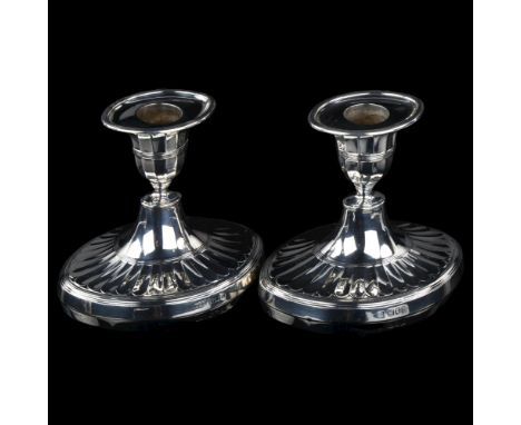 A matched pair of Neo-Classical style silver squat table candlesticks, by Lambert & Co and Hawksworth, Eyre & Co Ltd, hallmar