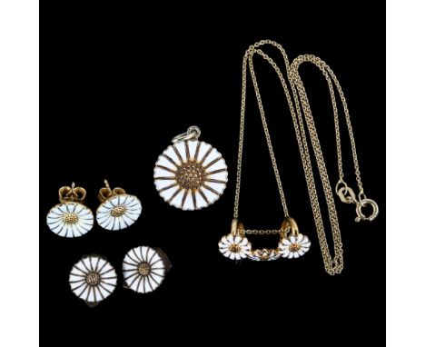 A matched set of Danish vermeil sterling silver and white enamel daisy pattern jewellery, comprising pendant necklace, pair o