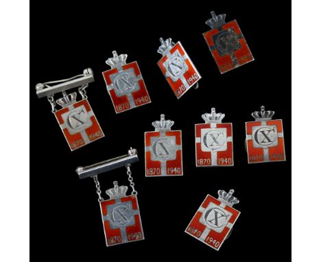 GEORG JENSEN - 9 Danish sterling silver and red enamel Kingmark badges and brooches, height 23.8mm, 31.9g totalA few very min