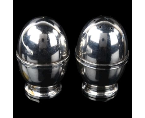 A pair of Danish silver egg-shaped cruets, height 5.5cmNo damage or repairs, 1 very minor dent on base, light abrasions all o