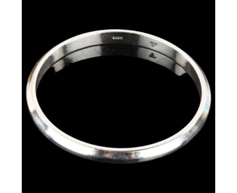 BERNHARD HERTZ - a heavy Danish silver slave bangle, band width 6.7mm, internal circumference 20cm, 48.2gNo damage or repairs