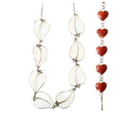 A Danish modernist sterling silver and red enamel heart line bracelet, and a similar leaf necklace, makers include Bernard Me