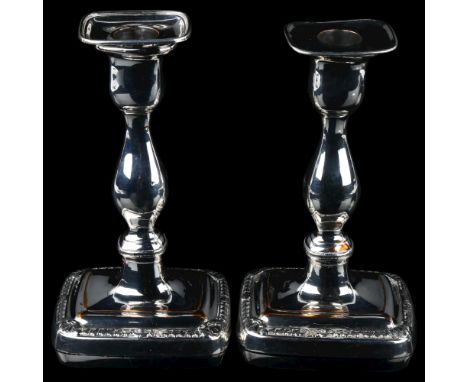 A pair of silver plated table candlesticks, height 18cmLot sold as seen unless specific item(s) requested 