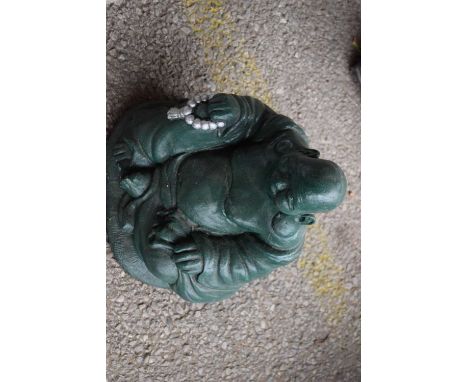 Composite garden statue formed as a Buddha, height 25cm